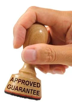 Guarantee printed on rubber stamp Stock Photos
