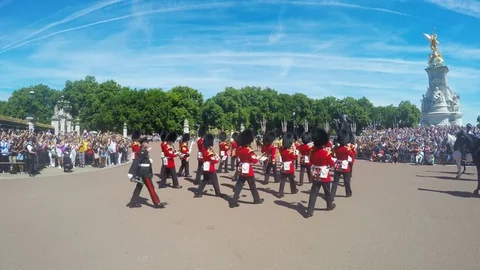 Guard Change marching in front of the Buckingham Palace in London, UK Stock Footage 79929601