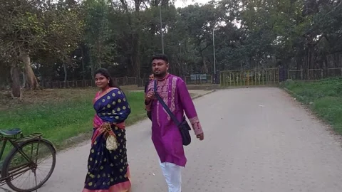 The guard is chasing visitors from the Botanic Garden. Stock Footage 175424554