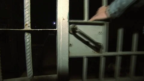 The guard closed the door to the prison cell Stock Footage 75454890
