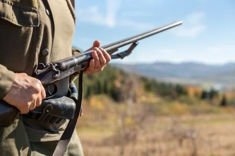 Guard on the environment at work, horizontal double-barreled shotgun in the h 스톡 사진