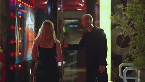 The guard opens the door to the visitor Stock Footage 206993529