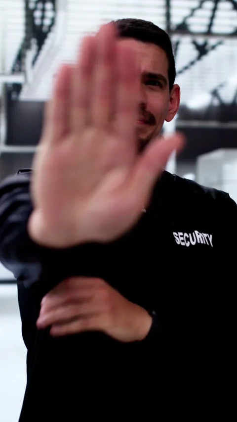 Guard Security Officer Making Stop Gesture Stock Footage 284481734