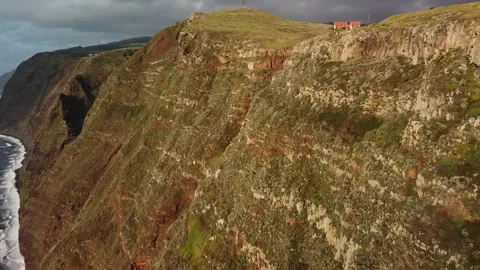Guardian of the Cliffs: Madeira Lighthouse Stock Footage 254422072