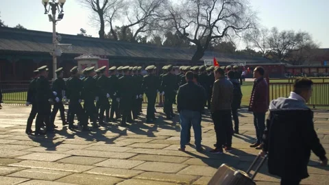 Guards Marching in Formation Past Visitors at Forbidden City Courtyard, Beijing Stock Footage 345831058