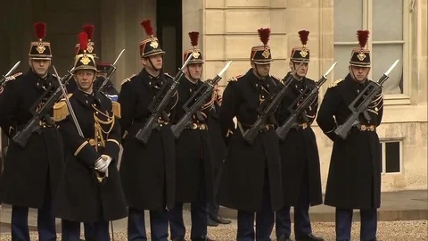 Guards stand outside the Élysée Palace - 2017 Stock Footage 86379155