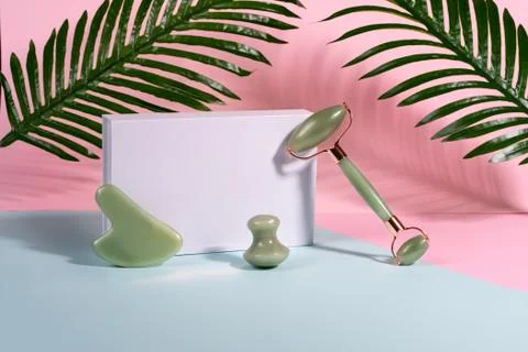 Guasha face massage device scraper for beautiful skin Stock Photos