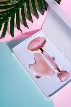 Guasha face massage device scraper for beautiful skin Stock Photos