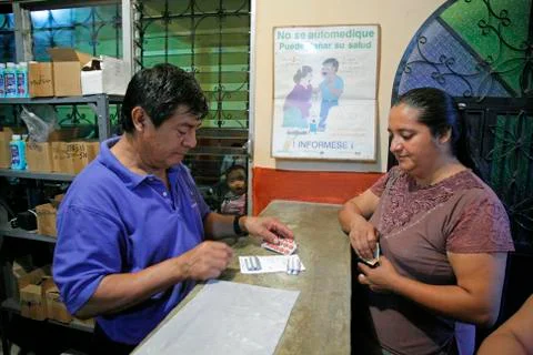 Guatemala paramedic explaining use of medication Stock Photos