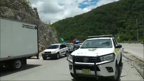 Guatemala: Trailer Overturns on CA-9 Norte, Blocking Major Route Stock Footage 282718925