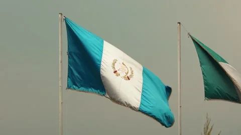 Guatemalan flag moving in the wind in slow motion Stock Footage 272971557