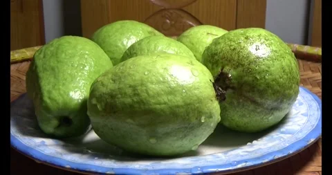 Guava on the plate Stock Footage 296133911