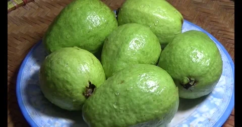 Guava on the plate Stock Footage 296133979