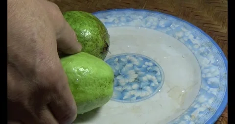 Guava on the plate Stock Footage 296133999