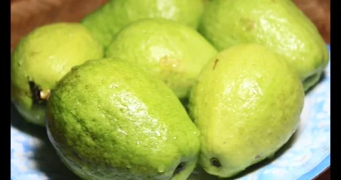 Guava on plate Stock Footage 296134045