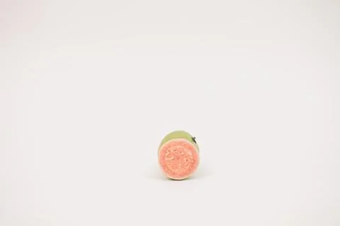 Guavas on the white background Stock Photos