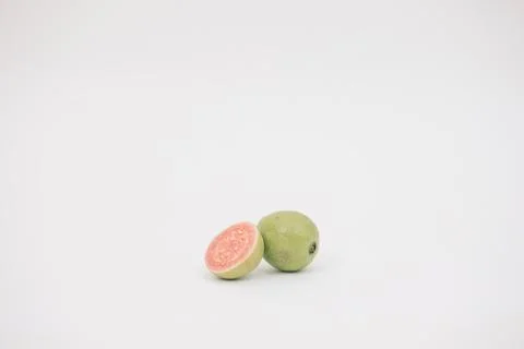 Guavas on the white background Stock Photos