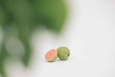 Guavas on the white background Stock Photos
