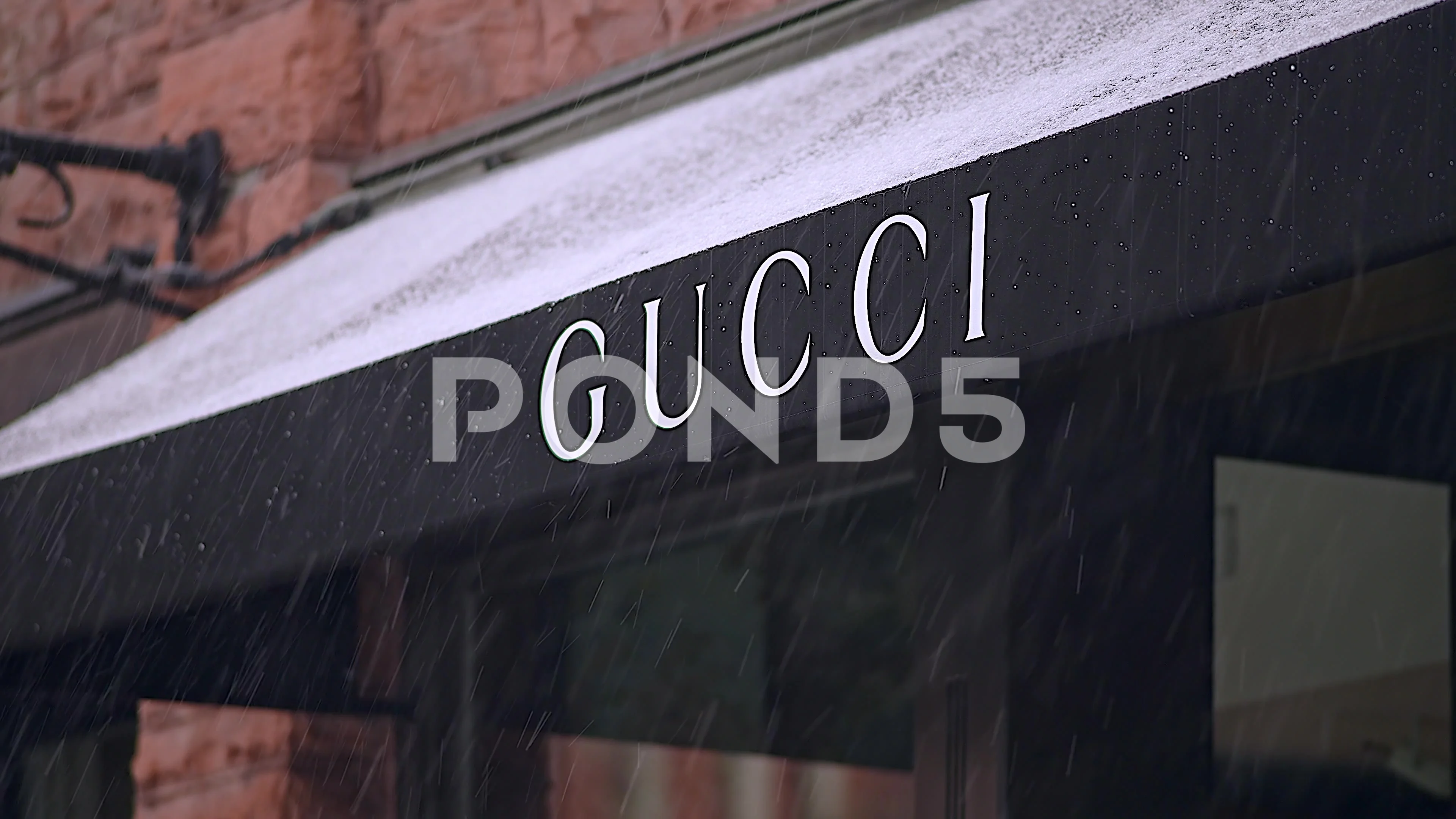 Gucci Store In Aspen, CO in Falling Snow | Stock Video | Pond5