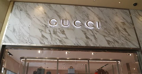 Street view luxury Gucci and Prada store, Stock Video