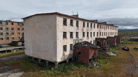 Gudym ghost town in Chukotka, decaying Soviet housing on permafrost stilts Stock Footage 327121557