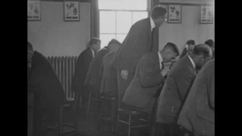 GUELPH - 1920s - Students use microscopes to examine samples at the Ontario Stock Footage 341975873