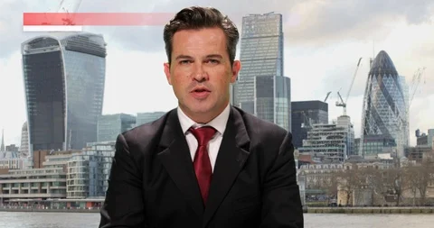 Guest being interviewed on Live Television in the city of London Stock Footage 113682336