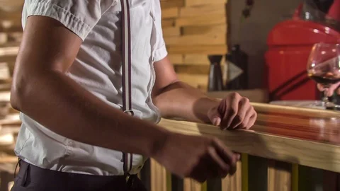 Guest gets some drinks and makes a sip Stock Footage 112200598