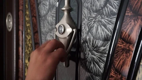 A guest knocking on the door with a doorknob, Video stock 109388657