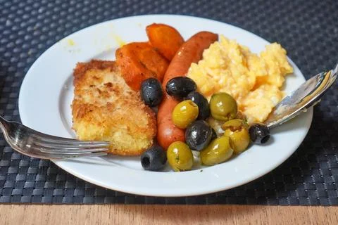 Guest Serving Breakfast from Buffet Plate Stock Photos
