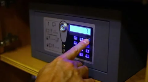Guest Uses Hotel Safe Hidden in Closet Stock Footage 7905593