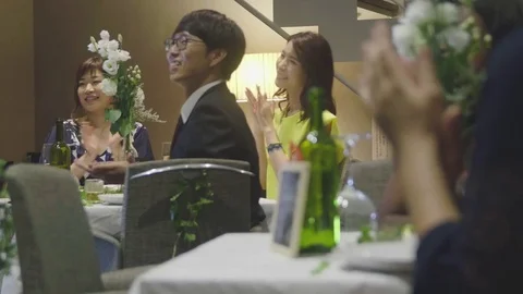 Guests clapping at wedding reception Stock Footage 77833853