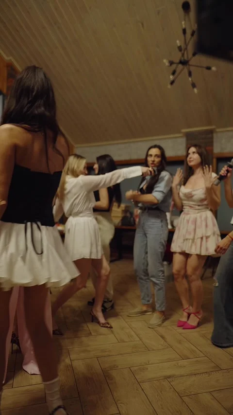 Guests dance and sing at the Ferienpark Hotel. Stock Footage 331645723