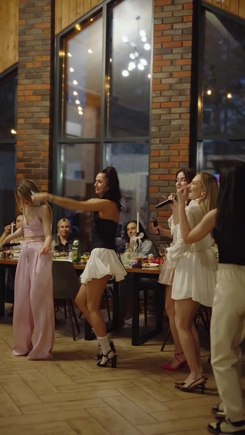 Guests dance and sing at the Ferienpark Hotel. Stock Footage 331645892