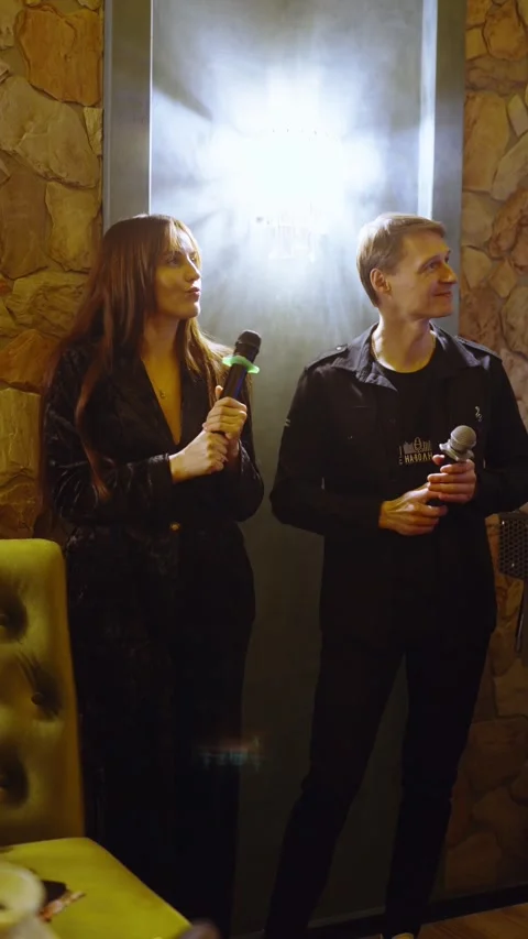 Guests dance and sing at the Ferienpark Hotel. Stock Footage 331649706