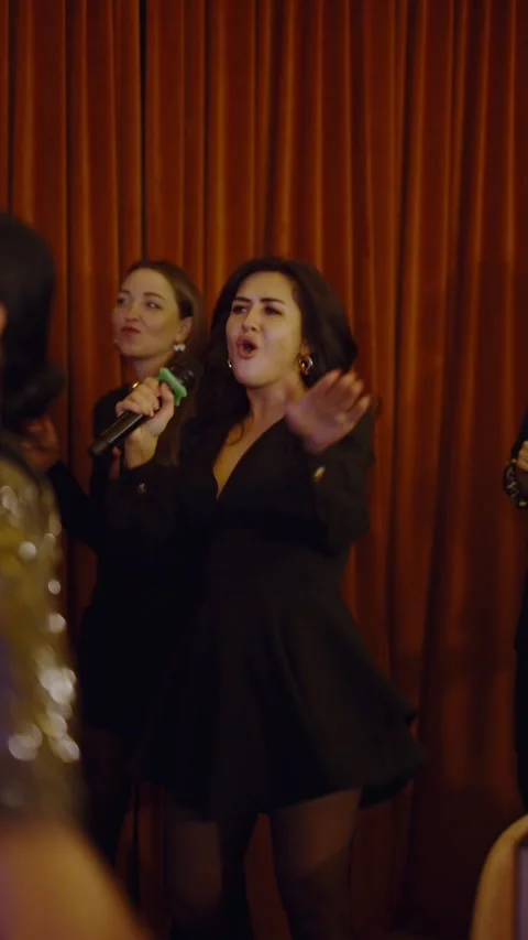 Guests dance and sing at the Ferienpark Hotel. Stock Footage 331650445