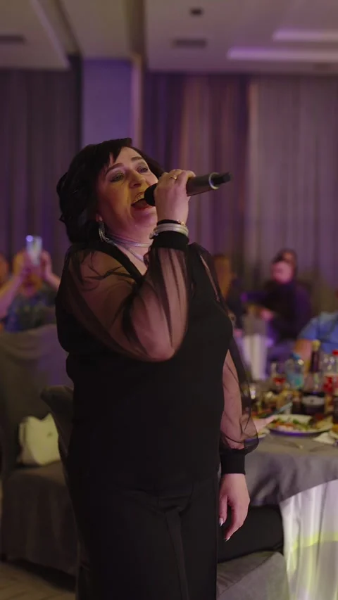 Guests dance and sing at the Ferienpark Hotel. Stock Footage 331656940