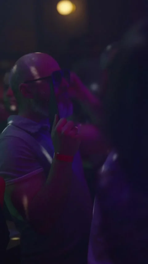 Guests dance and sing at the Ferienpark Hotel. Stock Footage 331869402