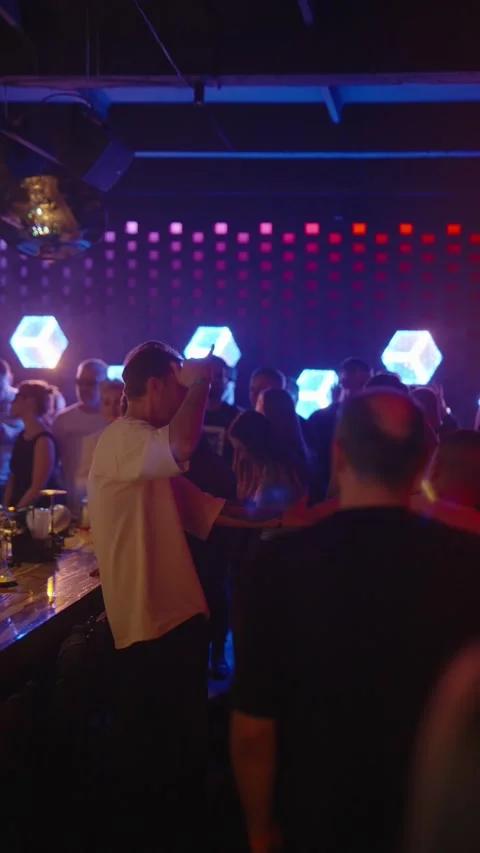 Guests dancing at the Matrix club Stock Footage 331572502