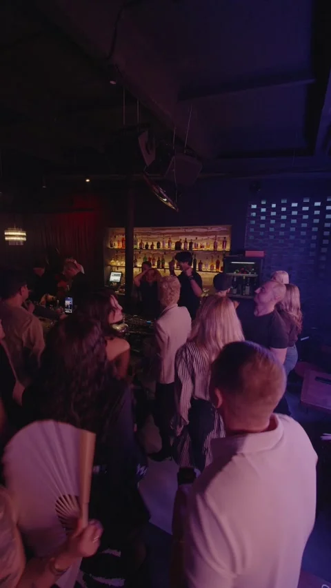 Guests dancing at the Matrix club Stock Footage 331572953