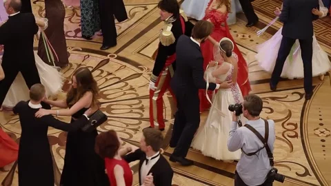 Guests in evening suits dance in pairs during Stock Footage 299629245