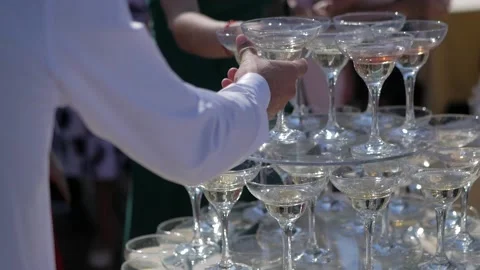 The guests' hands take glasses with wine at the party. Stock-Footage 132239448