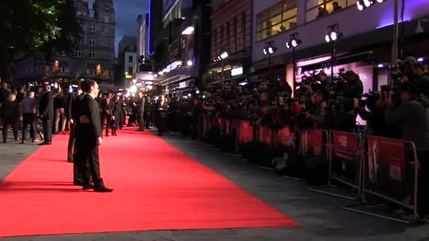 Guests pose on the red carpet Stock Footage 160369347