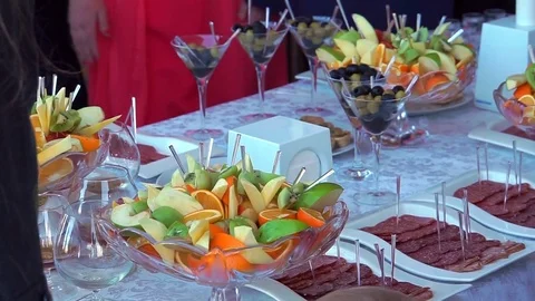 Guests take fruit from the buffet table. Stock Footage 75083522