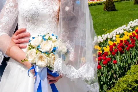 Guests Throwing Confetti Over Bride And Groom At Wedding Stock Photos