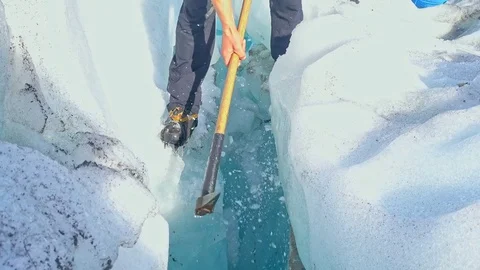 Guide to break the glaciers, Fox Glacier, New Zealand Stock Footage 79429221