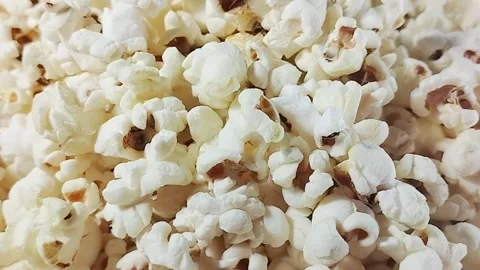 This guide explains the process of making flavorful homemade popcorn that’s Video stock 292754546