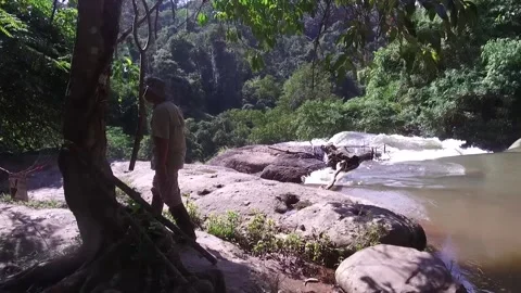 Guide at Haew Suwat Waterfall, Thailand Stock Footage 130699898