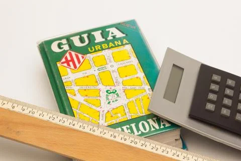 Guide, plan, book with the street map of a city Stock Photos