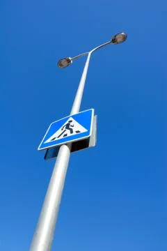 Guide sign, illumination column. Stock Photos